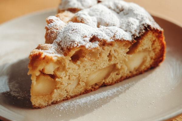 a-single-slice-of-freshly-baked-apple-cake-golden-