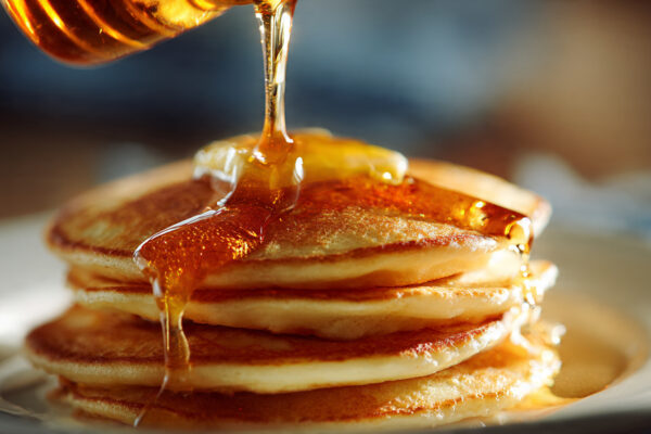 close-up-of-golden-melted-butter-being-poured-over