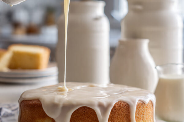 cake-being-soaked-with-a-smooth-pourable-liquid-mi