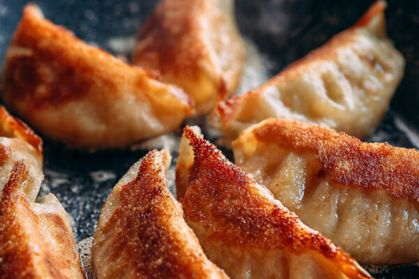 chicken-dumplings-cooking-in-a-non-stick-frying-pa