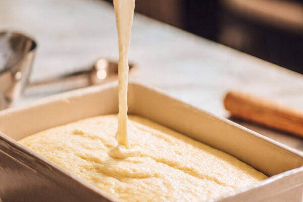 fresh-sponge-cake-batter-poured-into-a-rectangular